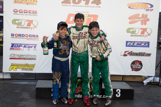 Michael d'Orlando (c) celebrates his TaG Cadet Championship with Lochie Hughes and brother Nicholas (Photo by: Studio52)